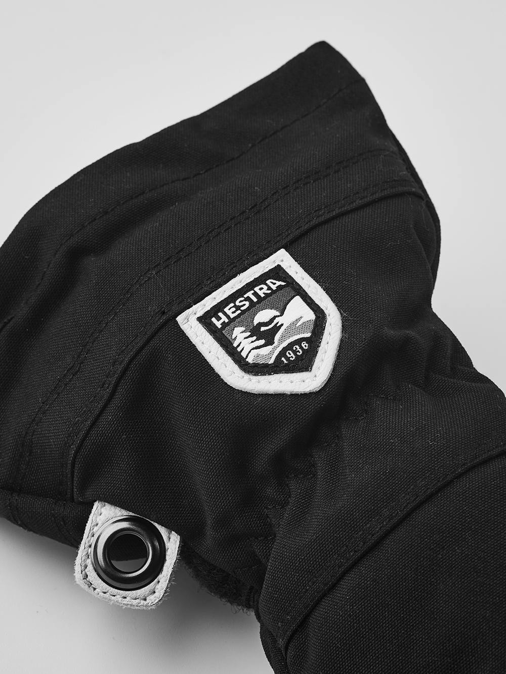 Svart tumhandske med vitt getskinn i innerhanden
 (2 av 8)