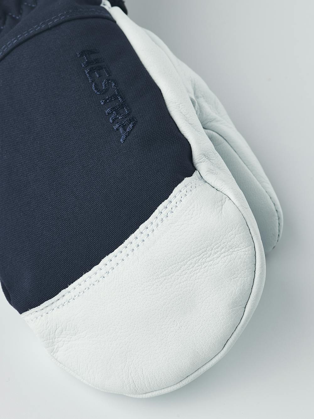 Dark blue mitten with white goat leather palm
(3 of 8)