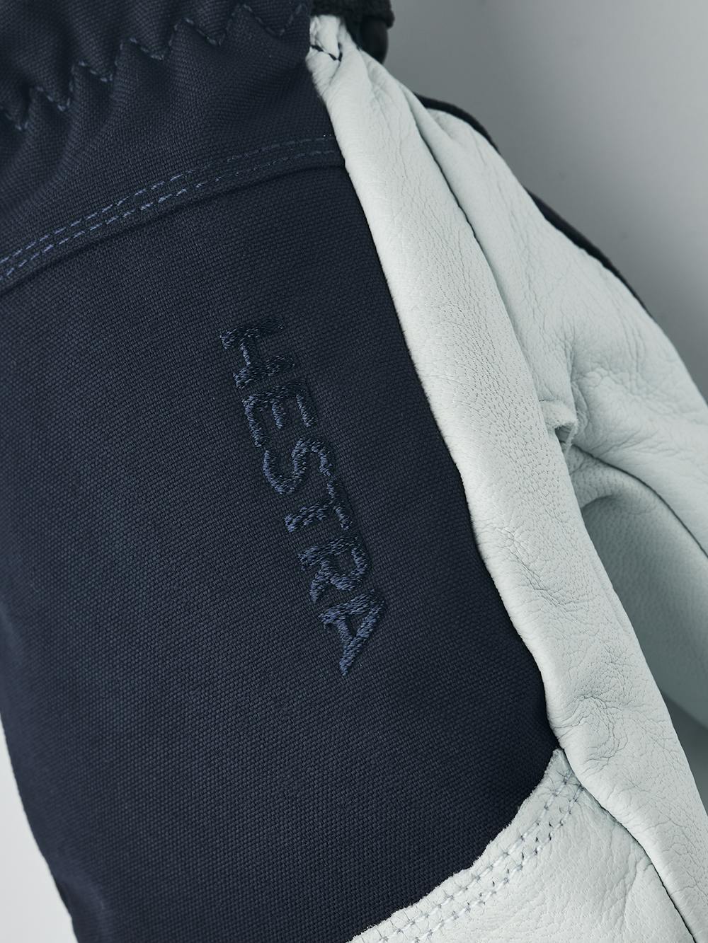 Dark blue mitten with white goat leather palm
(6 of 8)