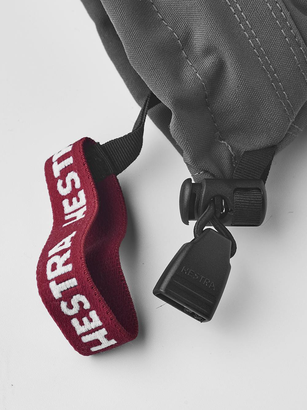 Gray three finger glove with white goat leather palm
 (6 of 6)