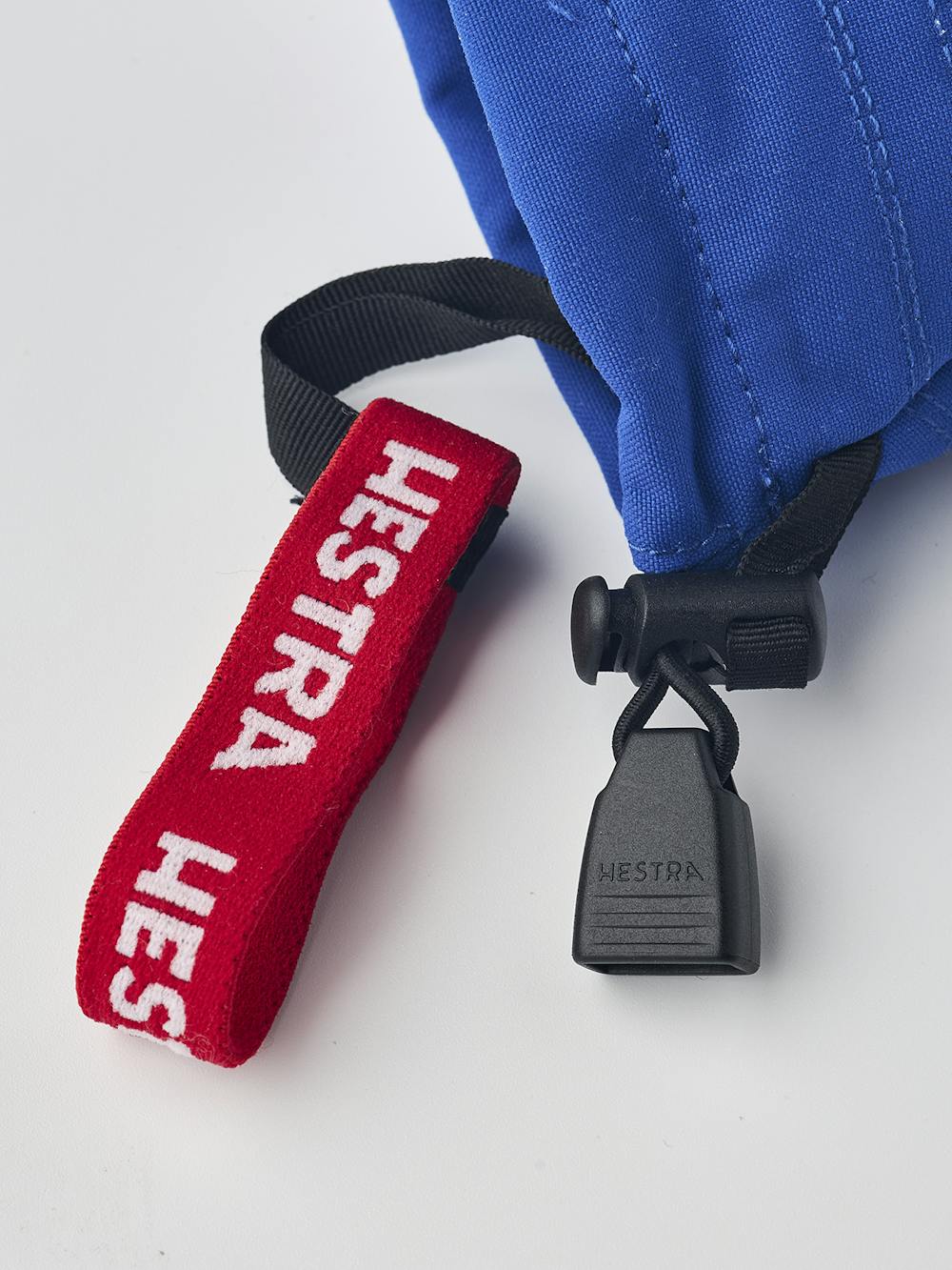 Blue three finger glove with white goat leather palm
(6 of 6)