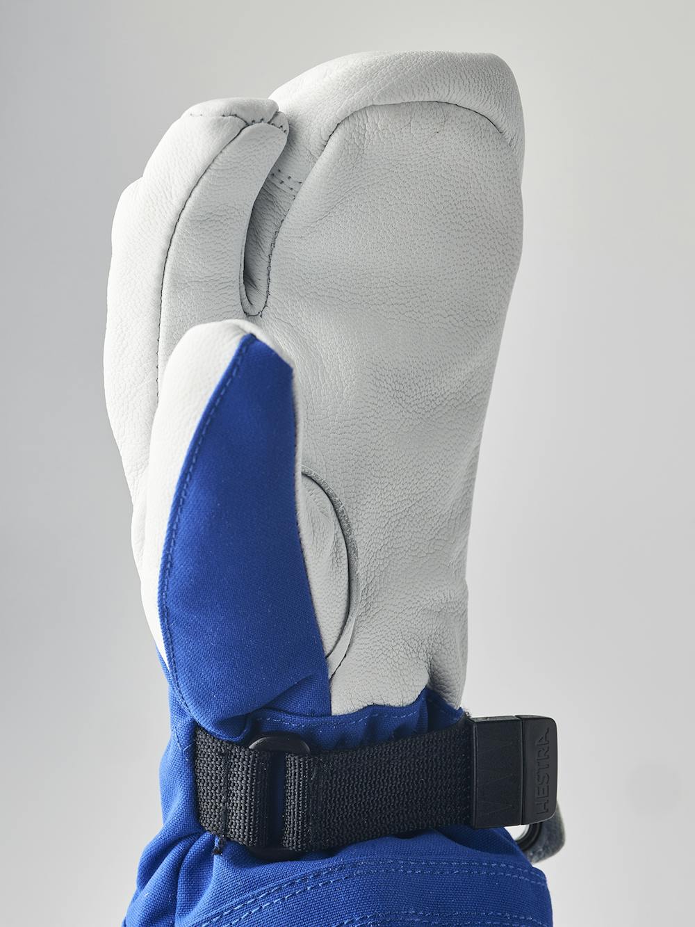 Blue three finger glove with white goat leather palm
(5 of 6)