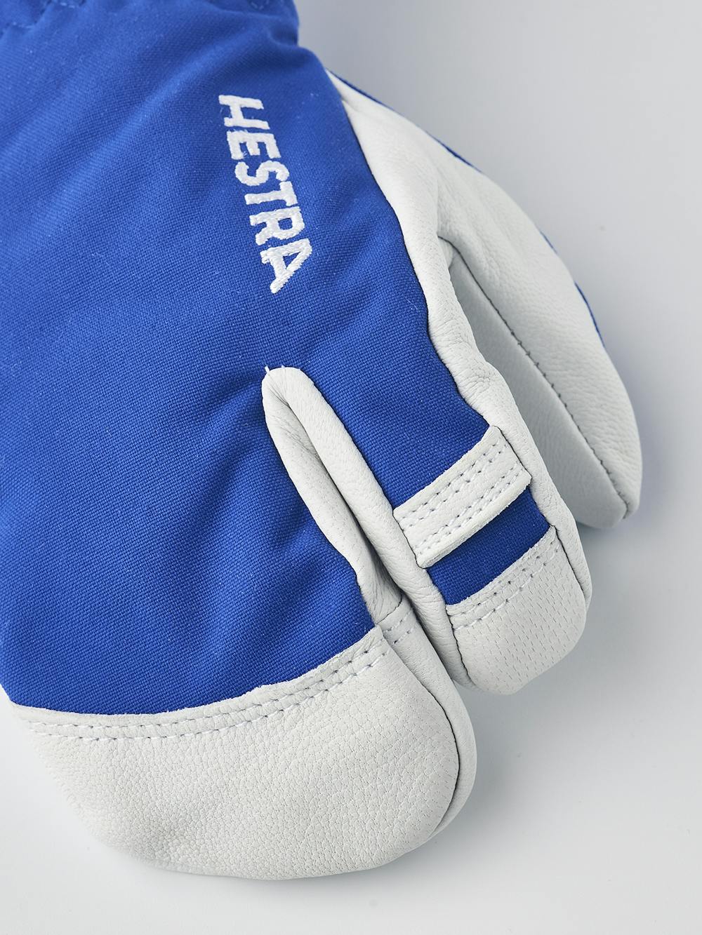 Blue three finger glove with white goat leather palm
 (2 of 6)