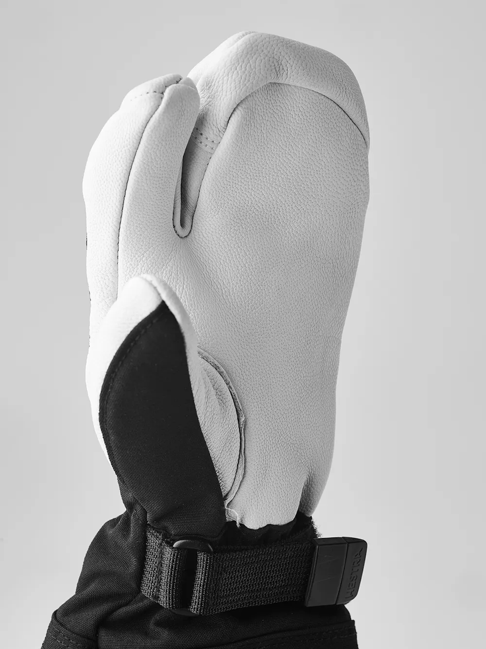 Black three finger glove with white goat leather palm
(6 of 6)