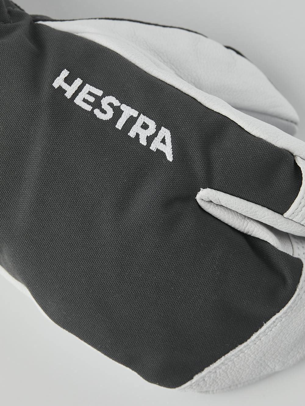 Gray three finger glove with white goat leather palm
(2 of 6)