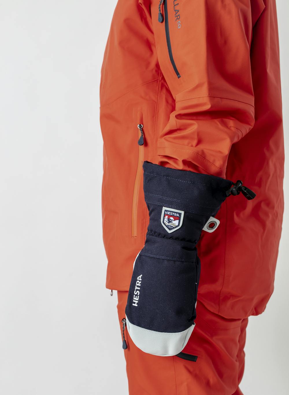 Dunkelblauer Fausthandschuh mit weißem Ziegenleder an der Innenhand
 (7 oder 10)