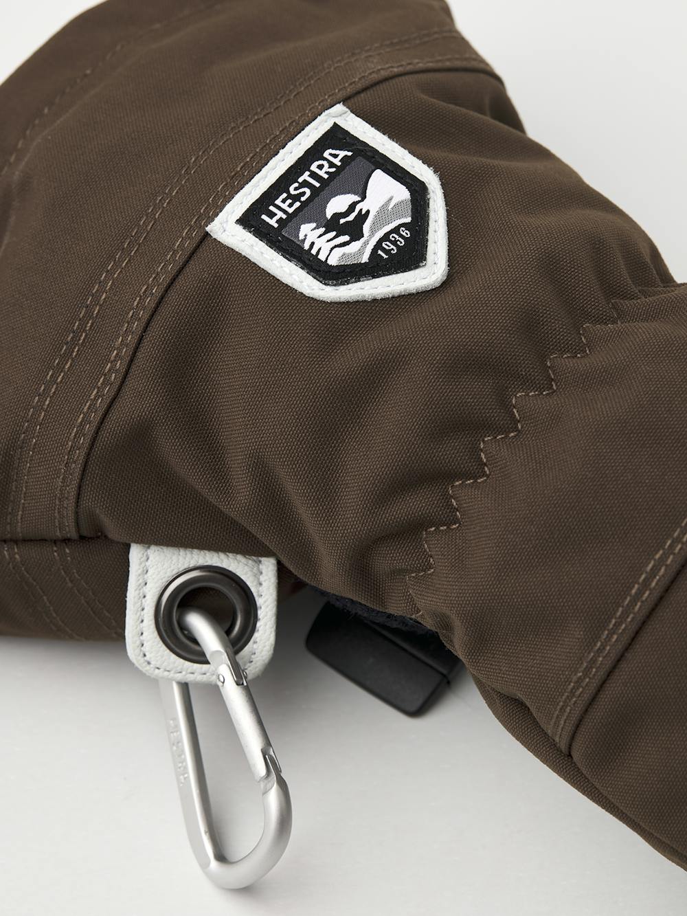 Dark brown mitten with white goat leather palm
(3 of 6)