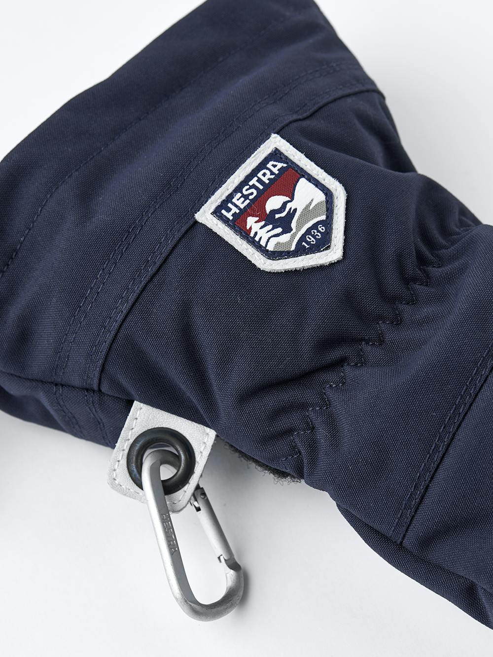 Dunkelblauer Fausthandschuh mit weißem Ziegenleder an der Innenhand
 (5 oder 10)