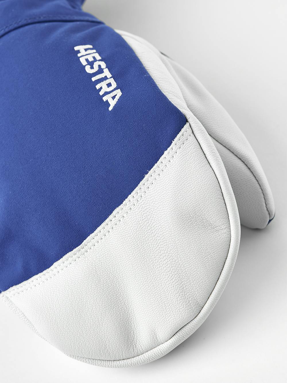 Blue mitten with white goat leather palm
 (2 of 7)