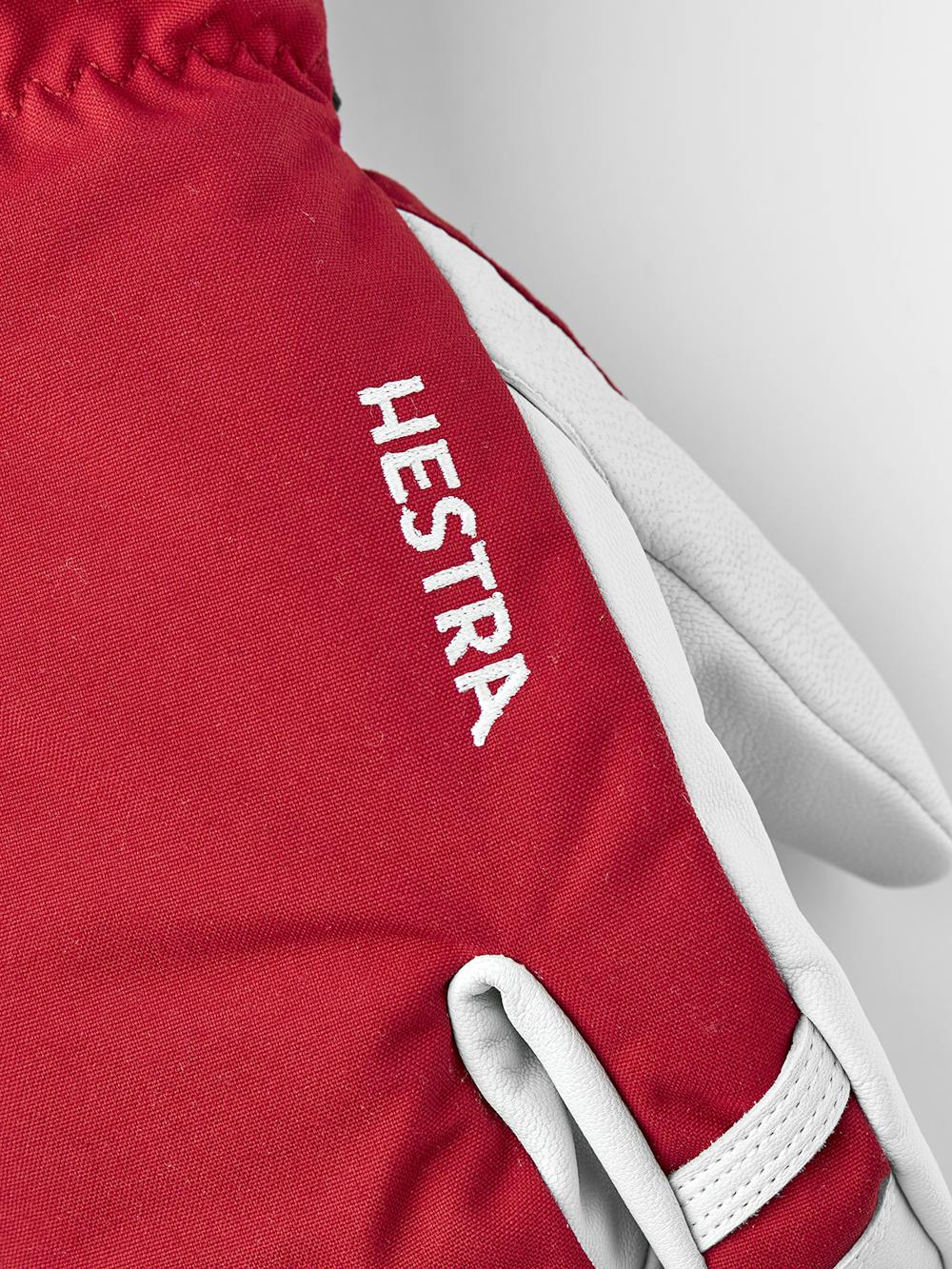 Roter Dreifingerhandschuh mit weißem Ziegenleder an der Innenhand
 (6 oder 8)