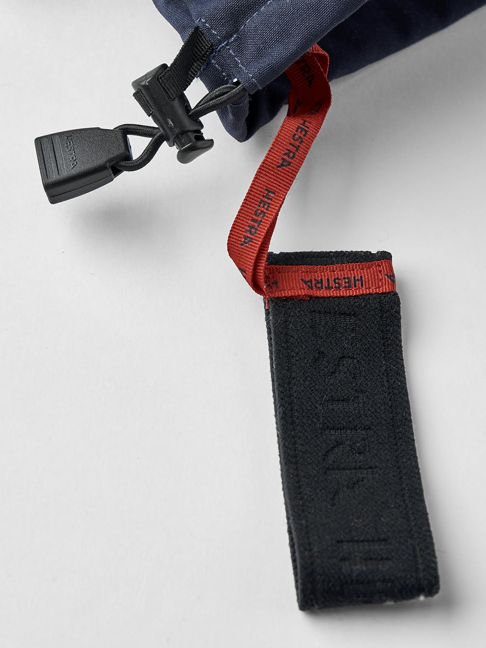 Dark blue three finger glove with white goat leather palm
 (3 of 6)