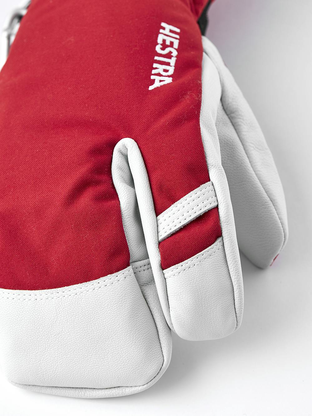 Roter Dreifingerhandschuh mit weißem Ziegenleder an der Innenhand
 (3 oder 8)