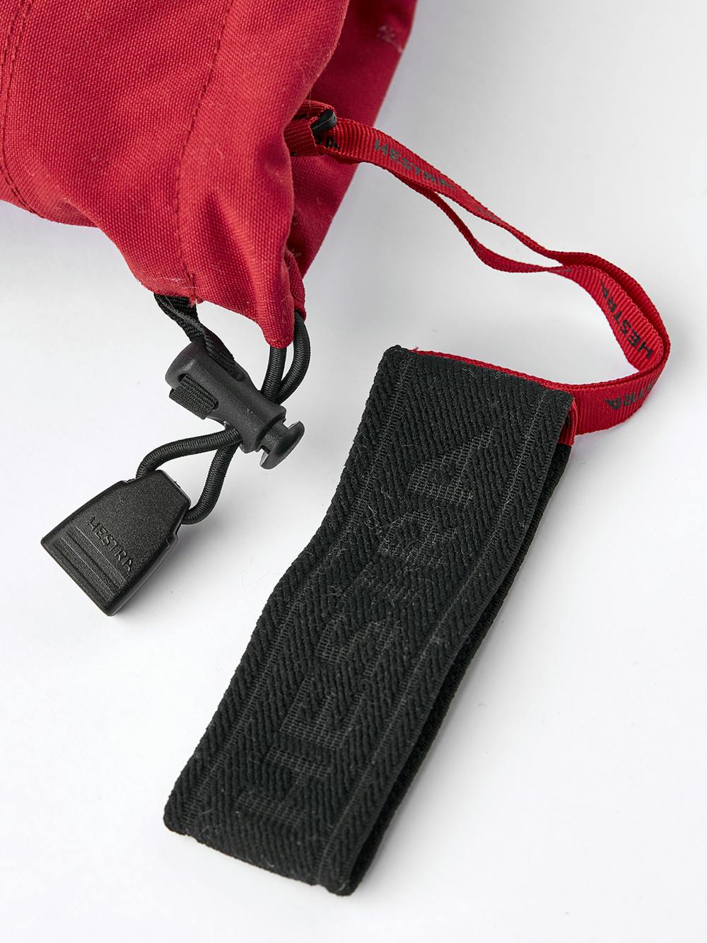 Roter Dreifingerhandschuh mit weißem Ziegenleder an der Innenhand
 (5 oder 8)