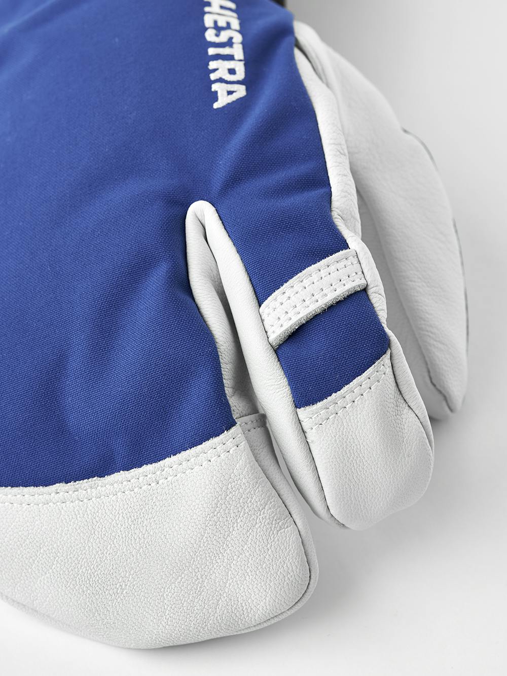 Blue three finger glove with white goat leather palm
 (3 of 7)
