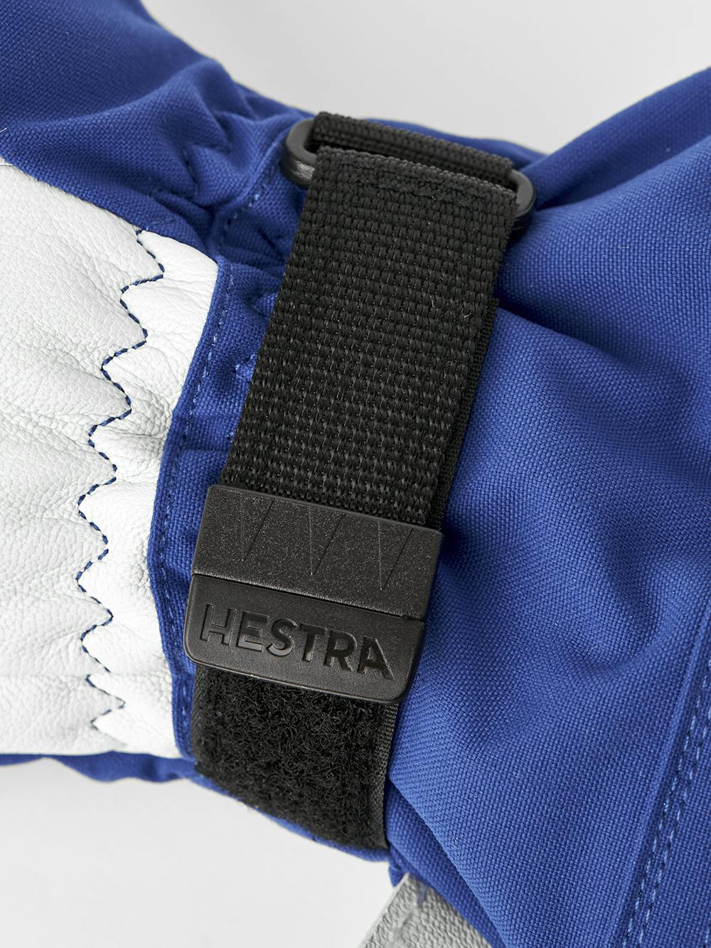 Blue three finger glove with white goat leather palm
(5 of 7)