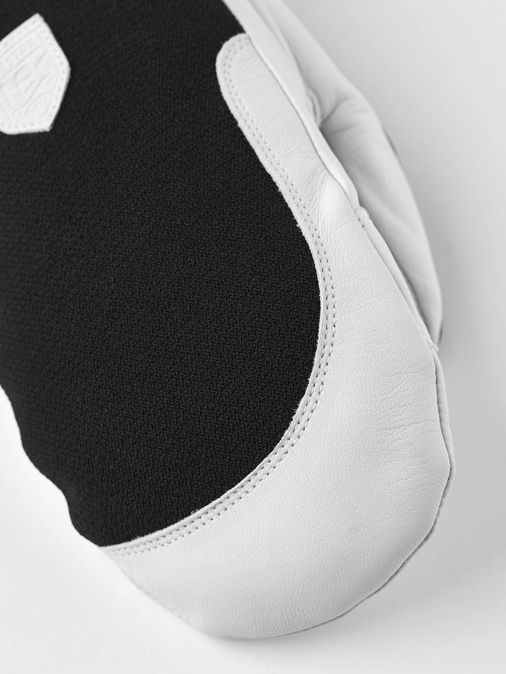 Schwarzer Fausthandschuh mit weißem Ziegenleder an der Innenhand
 (2 oder 5)