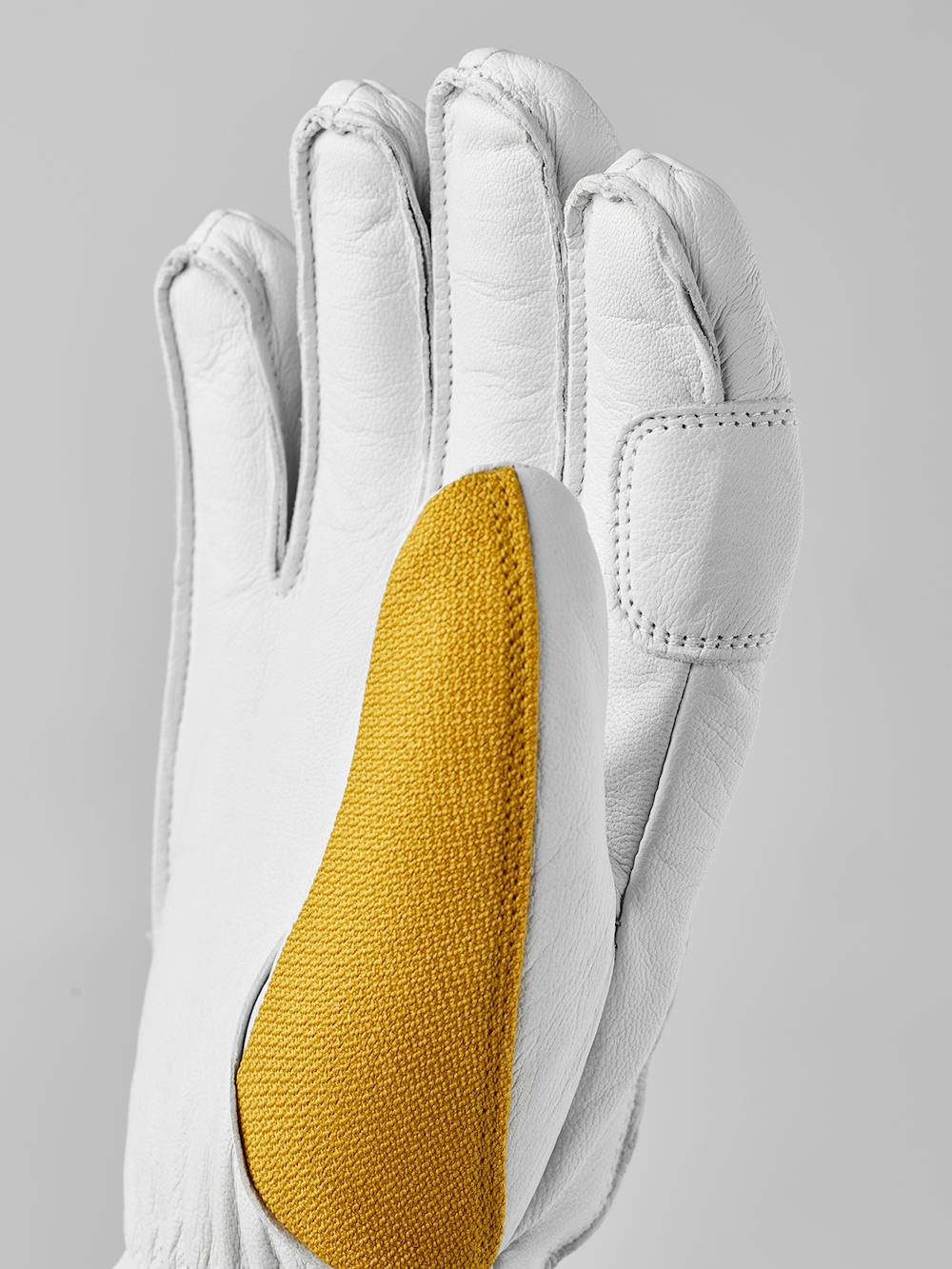Gelber Skihandschuh mit weißem Ziegenleder an der Innenhand
 (7 oder 10)