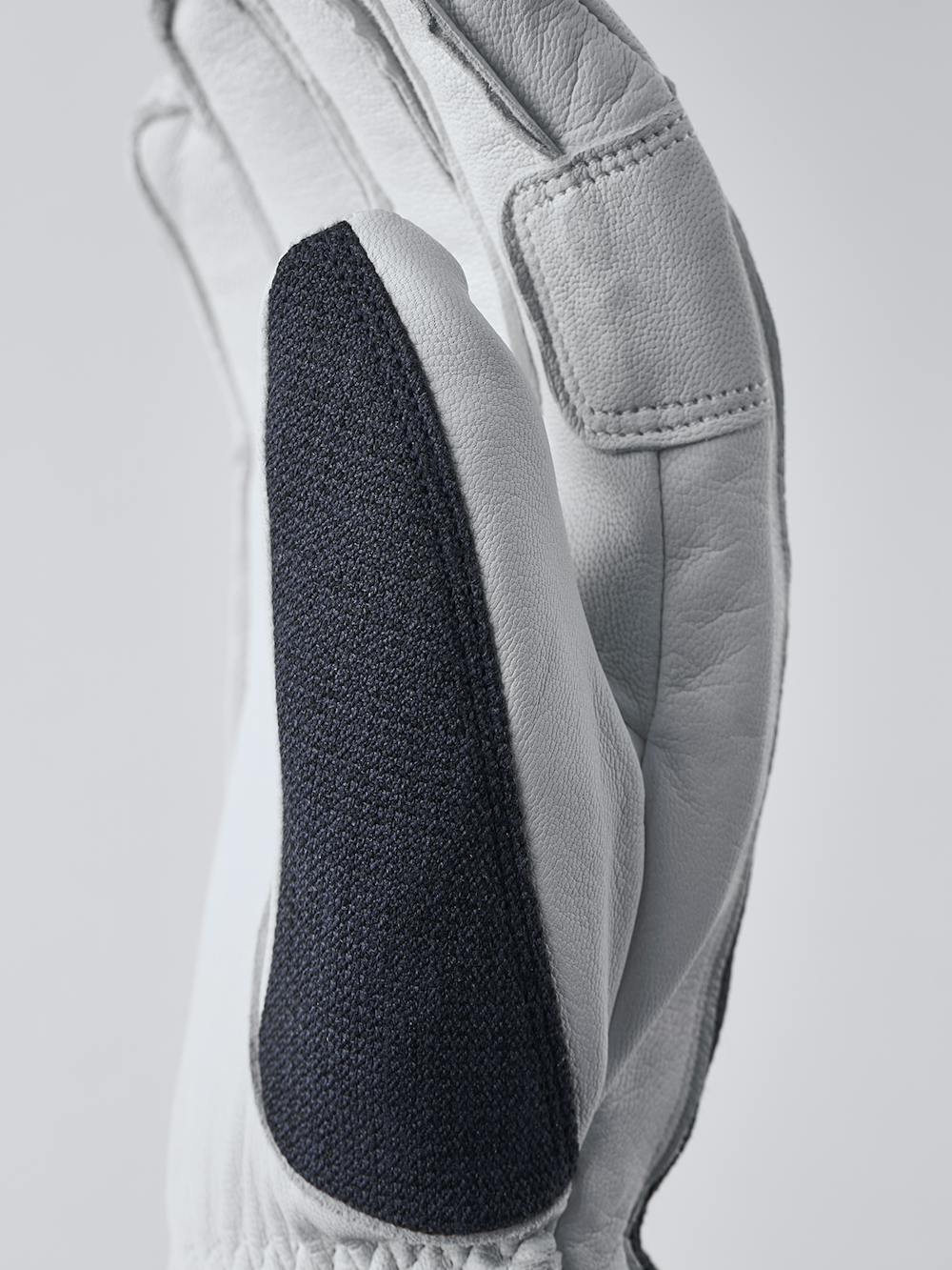 Dunkelblauer Skihandschuh mit weißem Ziegenleder an der Innenhand
 (4 oder 6)