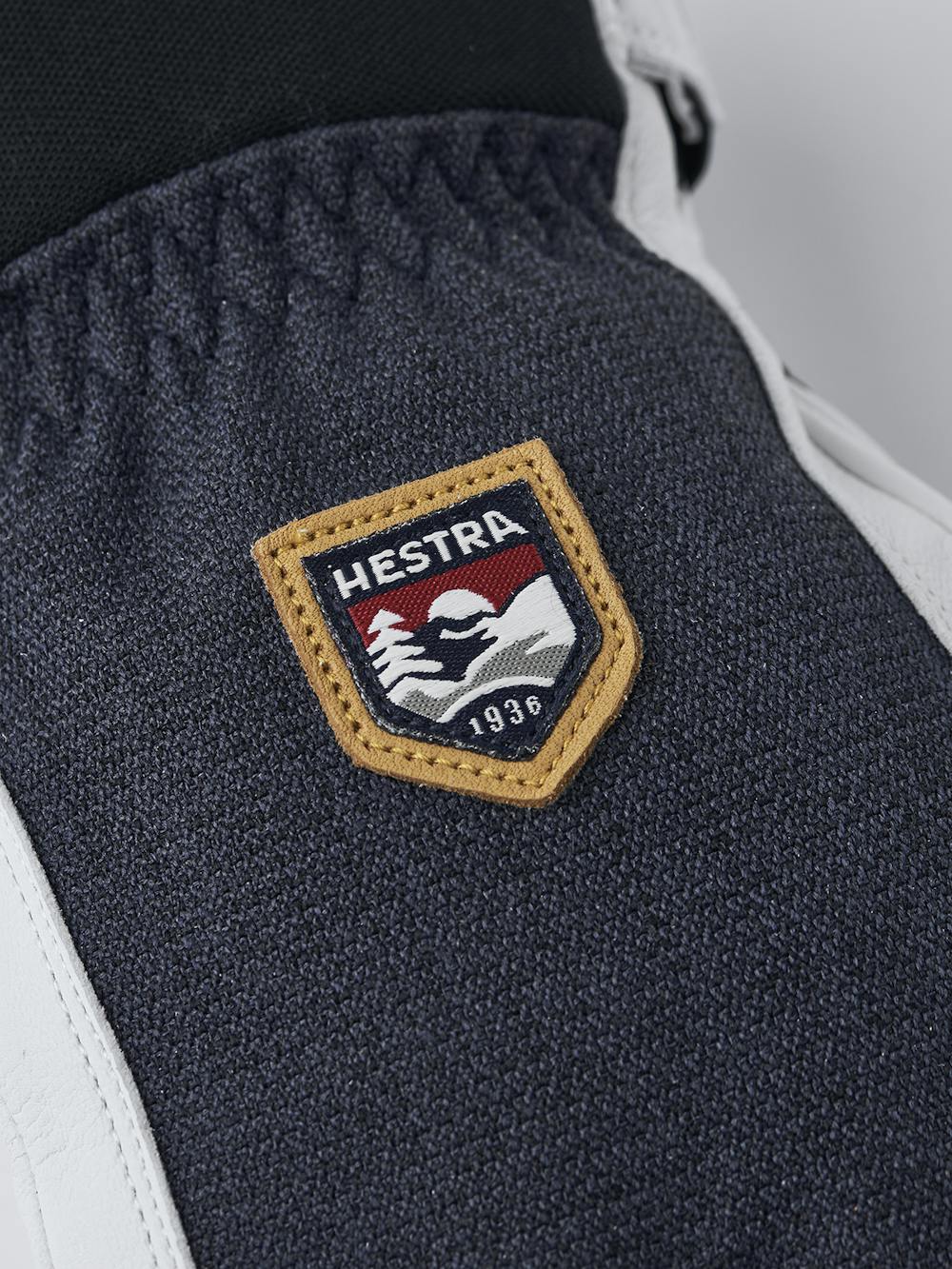 Dunkelblauer Skihandschuh mit weißem Ziegenleder an der Innenhand
 (3 oder 6)