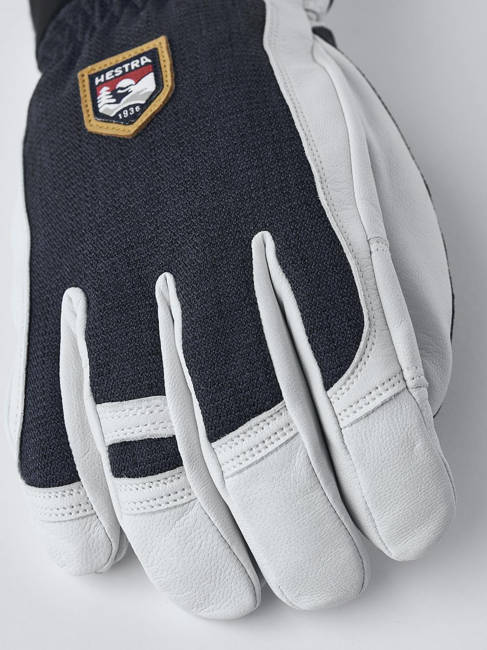 Dunkelblauer Skihandschuh mit weißem Ziegenleder an der Innenhand
 (2 oder 6)