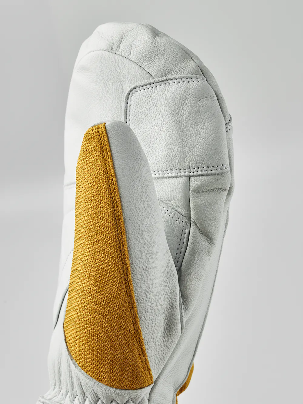 Yellow mitten with white goat leather palm
 (7 of 10)