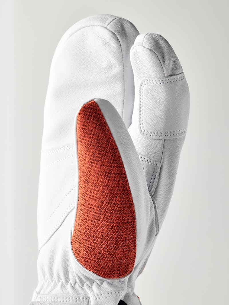 Brick red three finger glove with white goat leather palm
 (2 of 6)