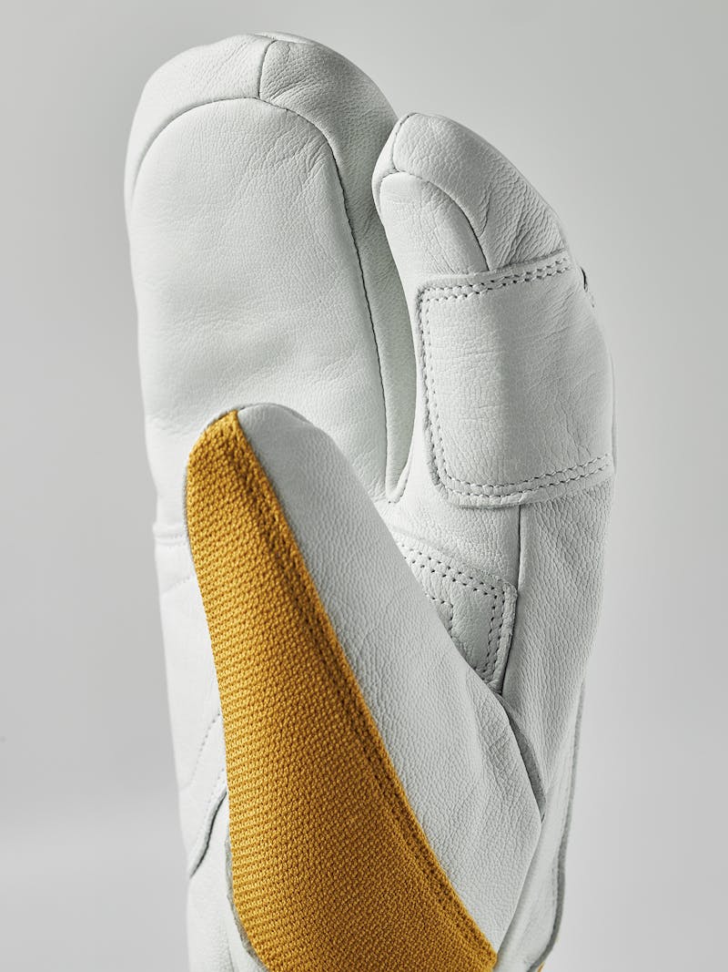 Yellow three finger glove with white goat leather palm
 (4 of 5)