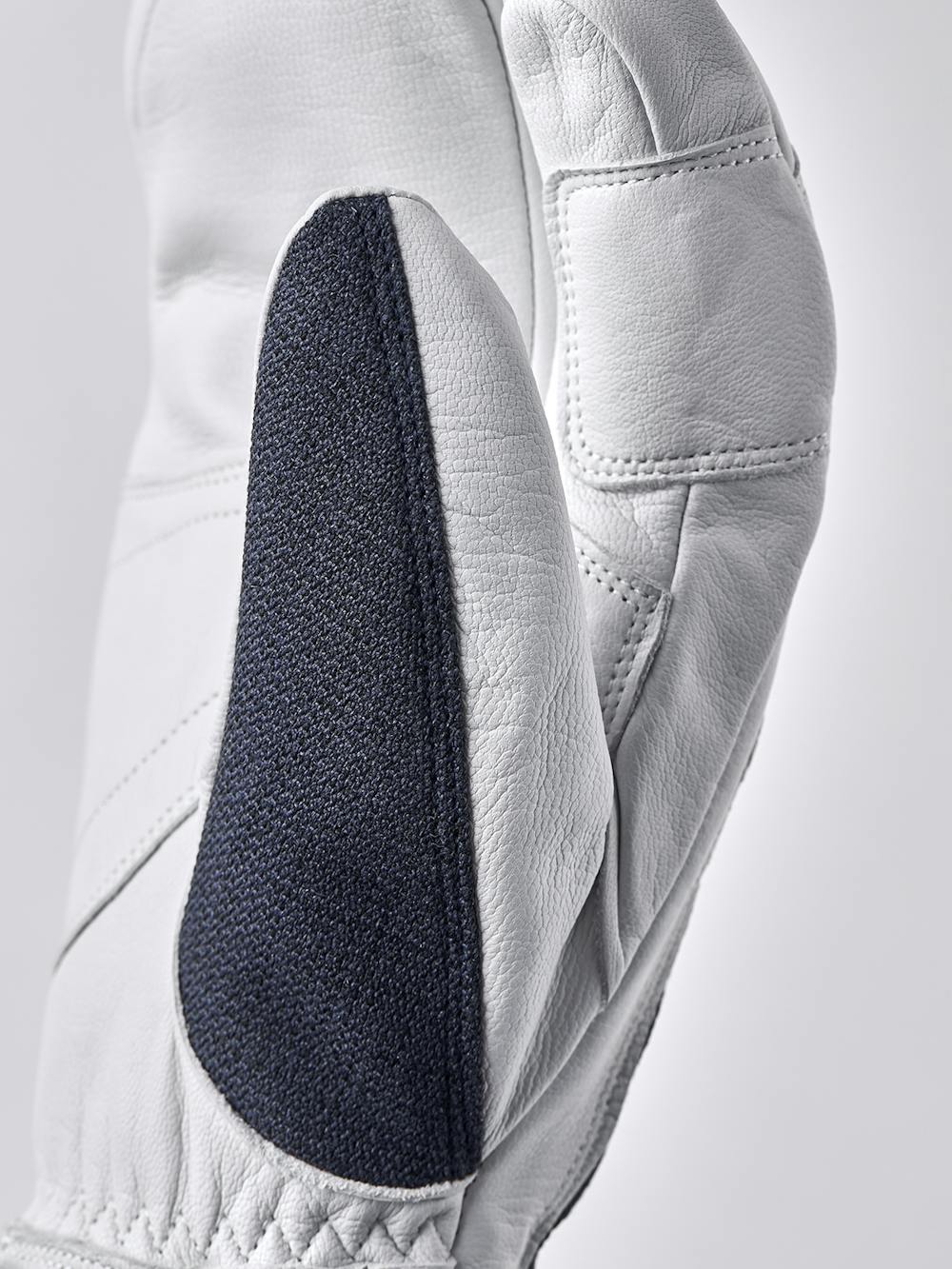 Dark blue three finger glove with white goat leather palm
 (3 of 5)