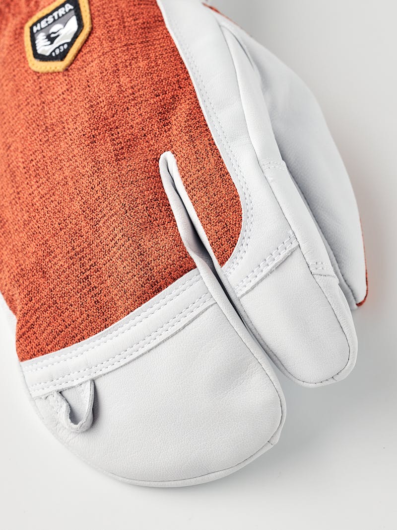 Brick red three finger glove with white goat leather palm
 (3 of 6)