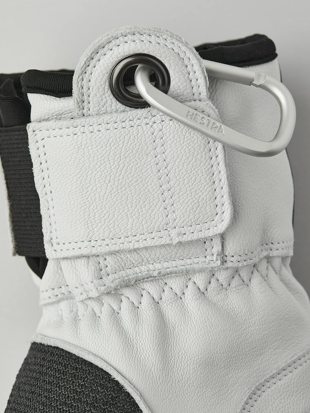 Dark gray three finger glove with white goat leather palm
 (5 of 6)