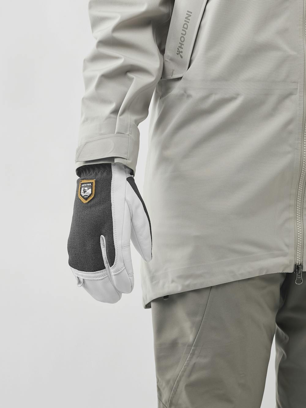 Dark gray three finger glove with white goat leather palm
 (6 of 6)