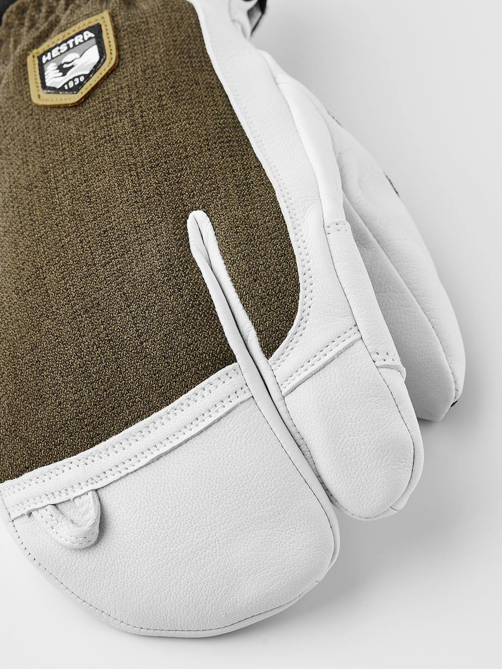 Moss green three finger glove with white goat leather palm
(2 of 4)