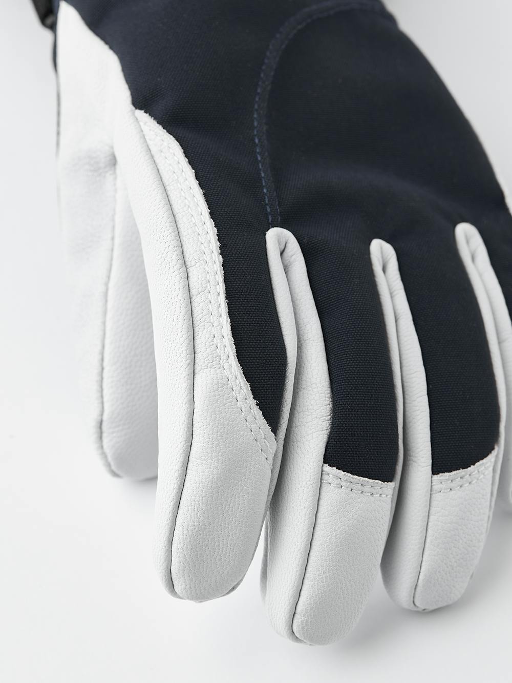 Dark blue ski glove with white goat leather palm
(3 of 7)