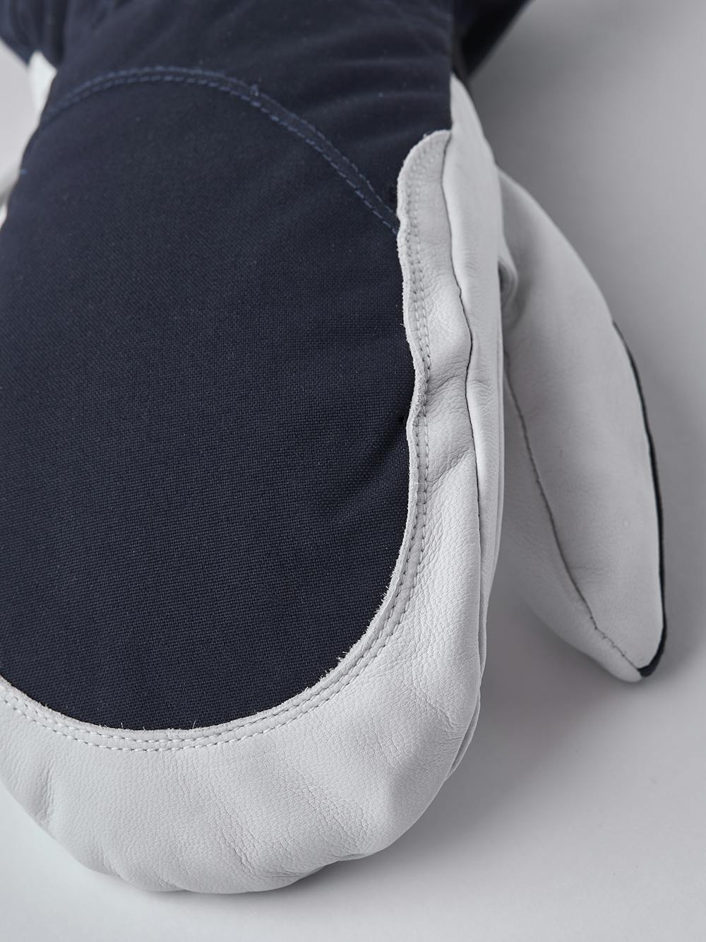 Dark blue mitten with white goat leather palm
(4 of 6)