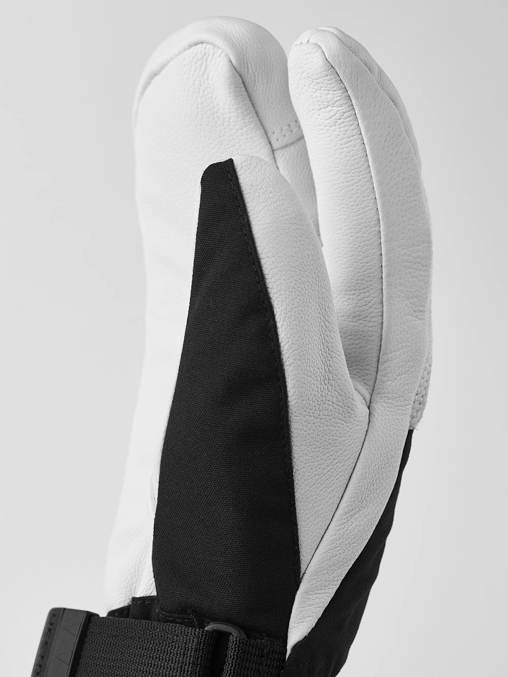 Black three finger glove with white goat leather palm
 (3 of 5)