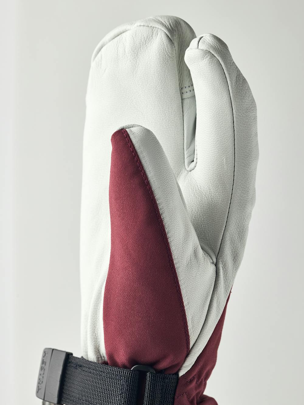 Wine red three finger glove with white goat leather palm
 (2 of 6)