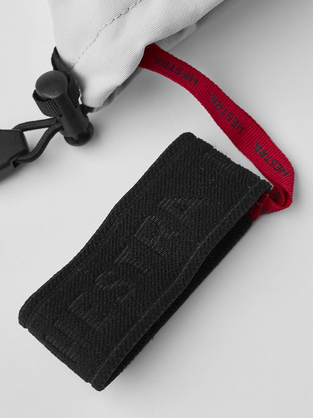 Light gray three finger glove with white goat leather palm
 (7 of 7)