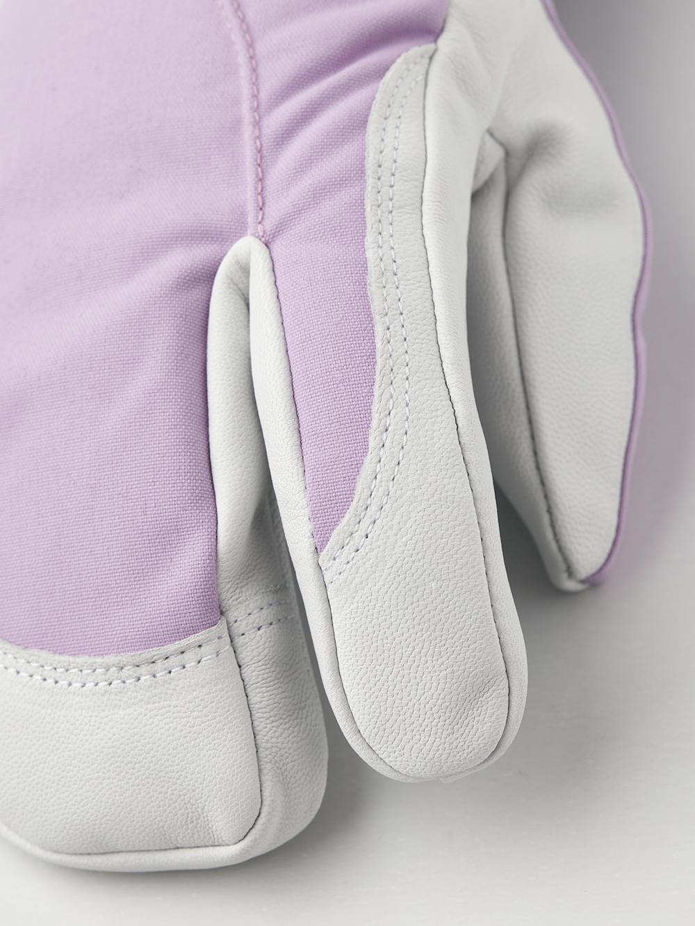 Light purple three finger glove with white goat leather palm
(2 of 6)