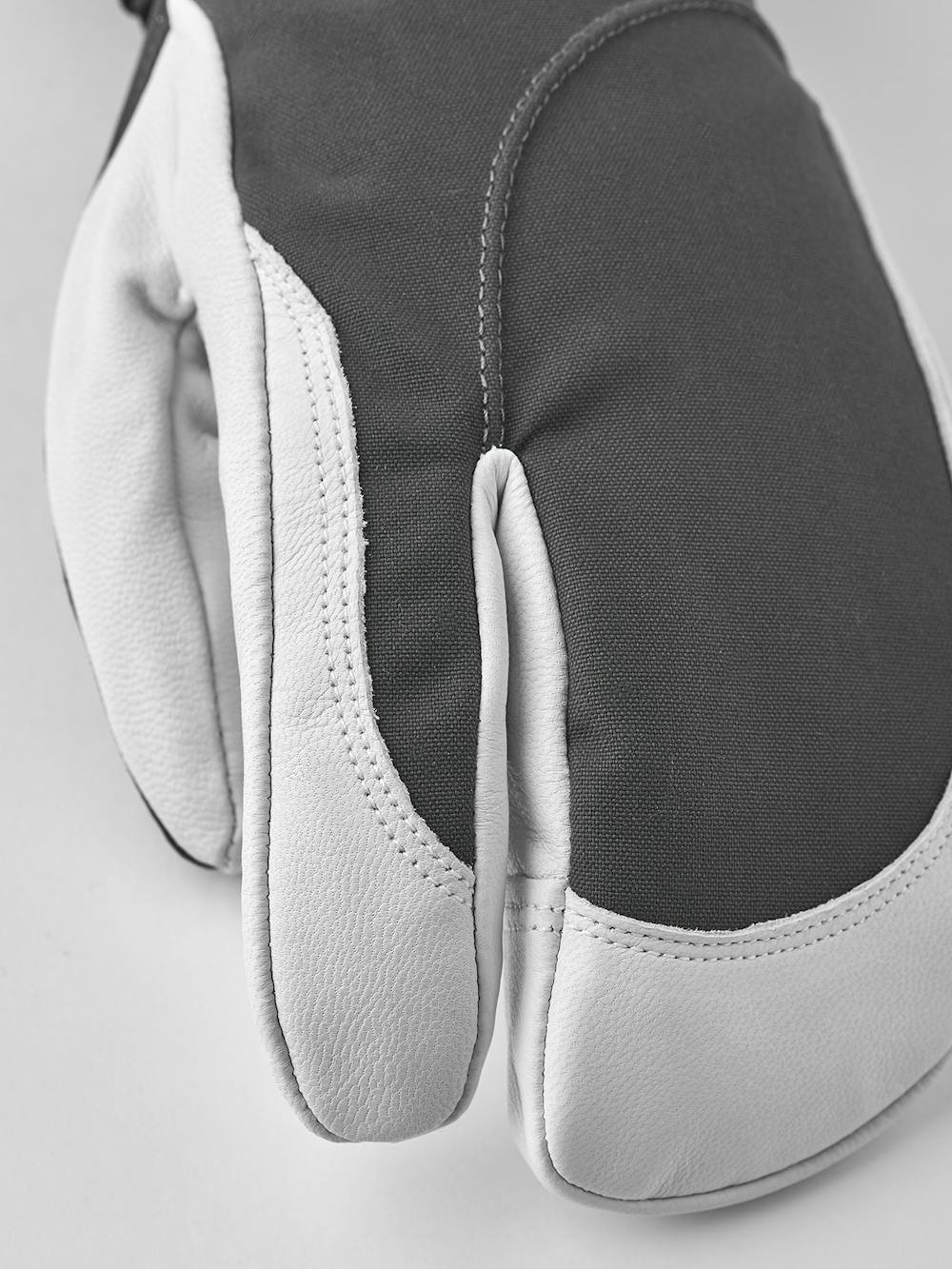 Gray three finger glove with white goat leather palm
(2 of 6)