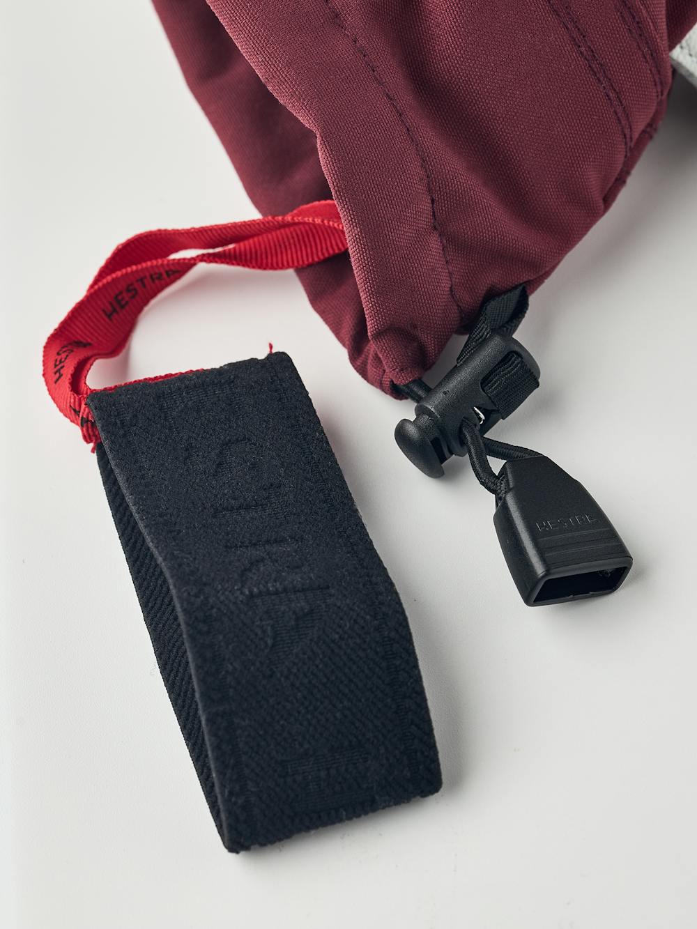 Wine red three finger glove with white goat leather palm
(6 of 6)