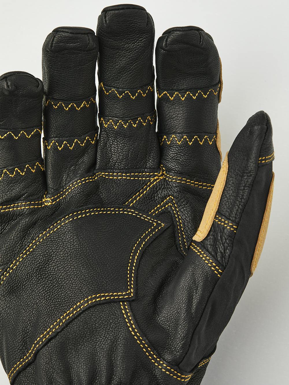 Schwarzer Skihandschuh mit Verstärkungen aus hellbraunem synthetischem Wildleder
 (2 oder 8)