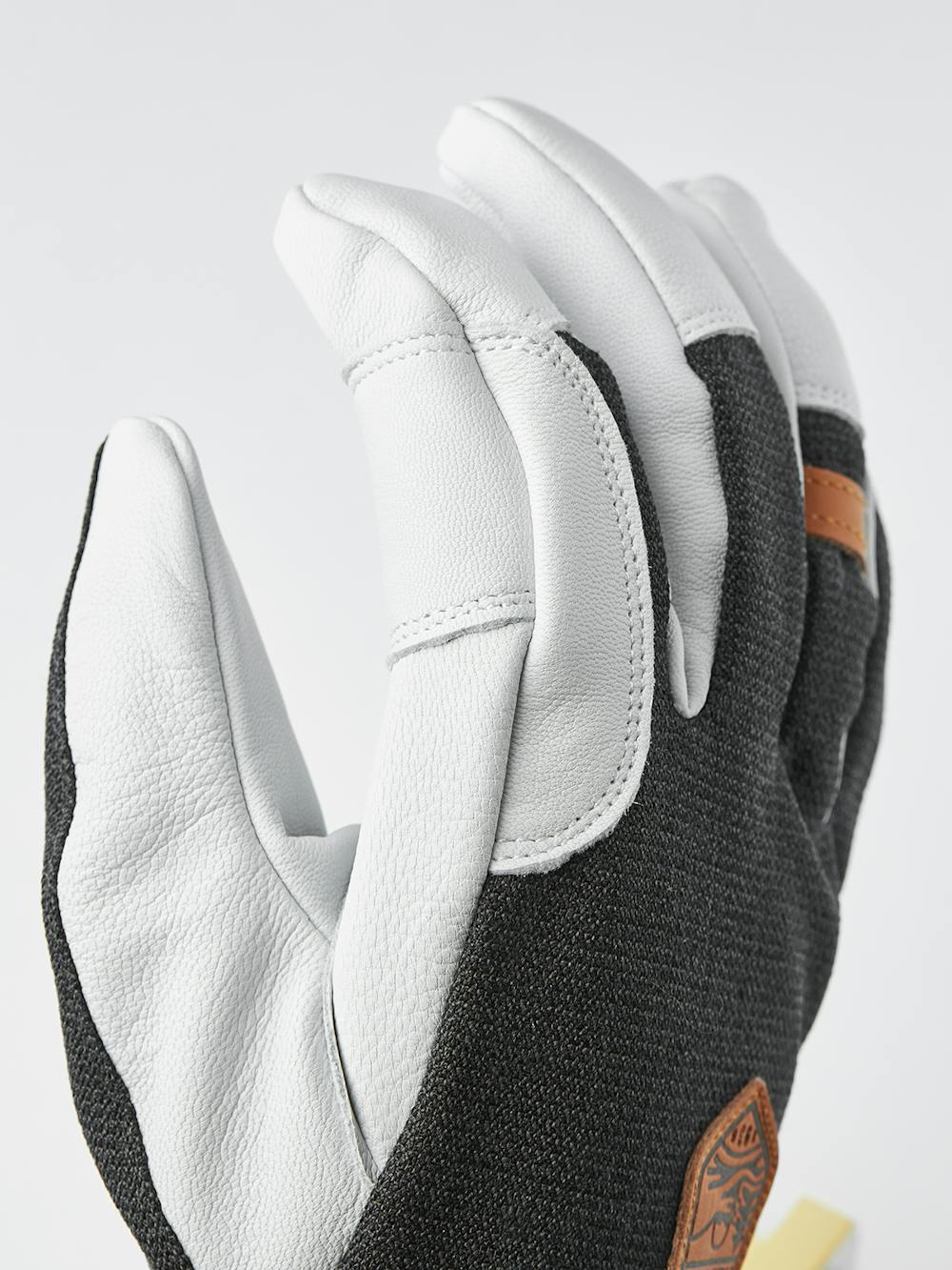 Dark gray ski glove with white goat leather palm
(11 of 11)