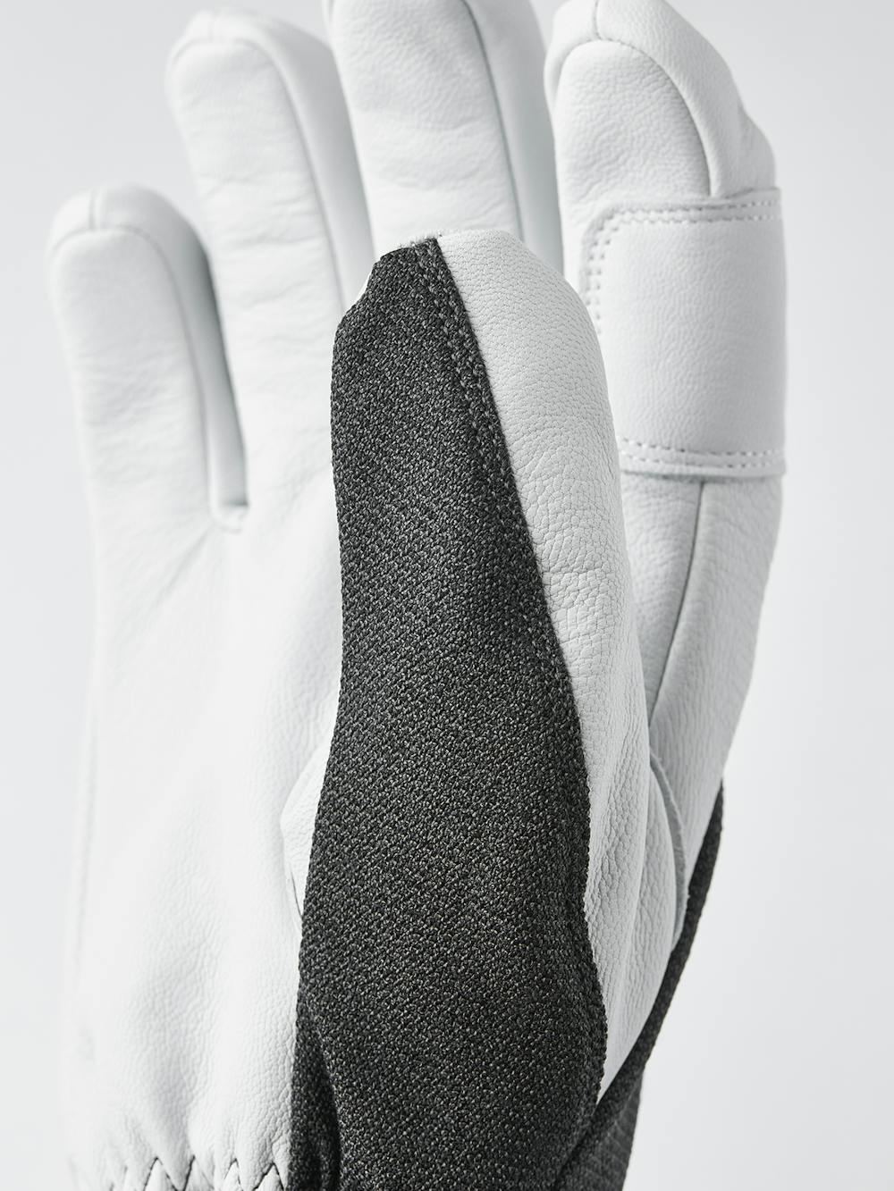 Dark gray ski glove with white goat leather palm
(9 of 11)