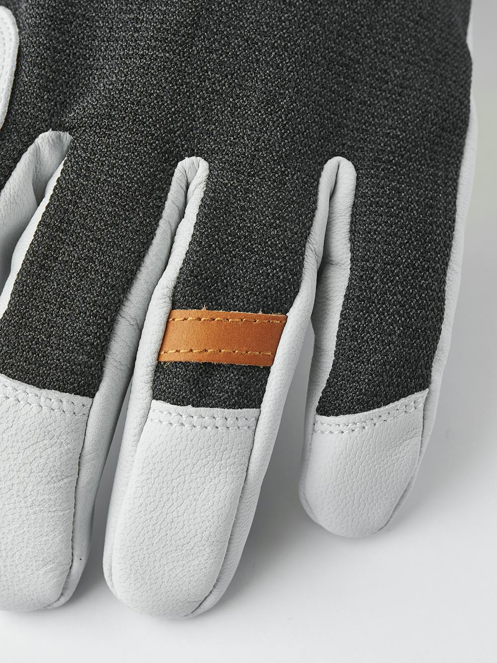 Dark gray ski glove with white goat leather palm
 (5 of 11)