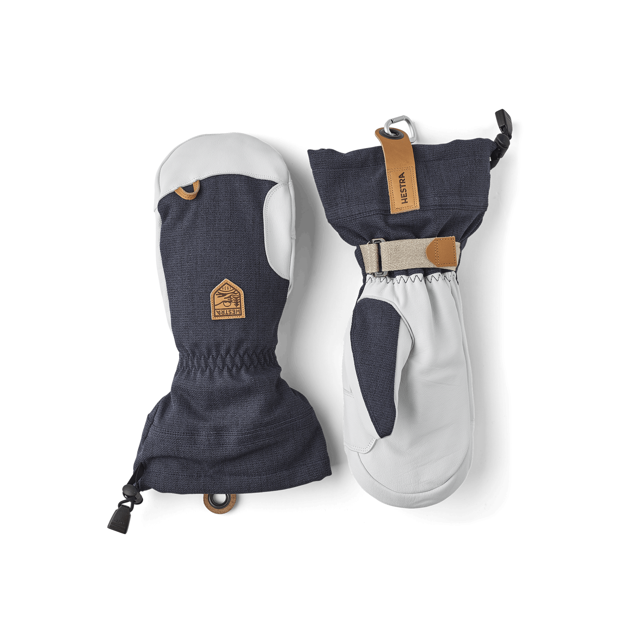 Mörkblå tumhandske med vitt getskinn i innerhanden
(1 av 6)