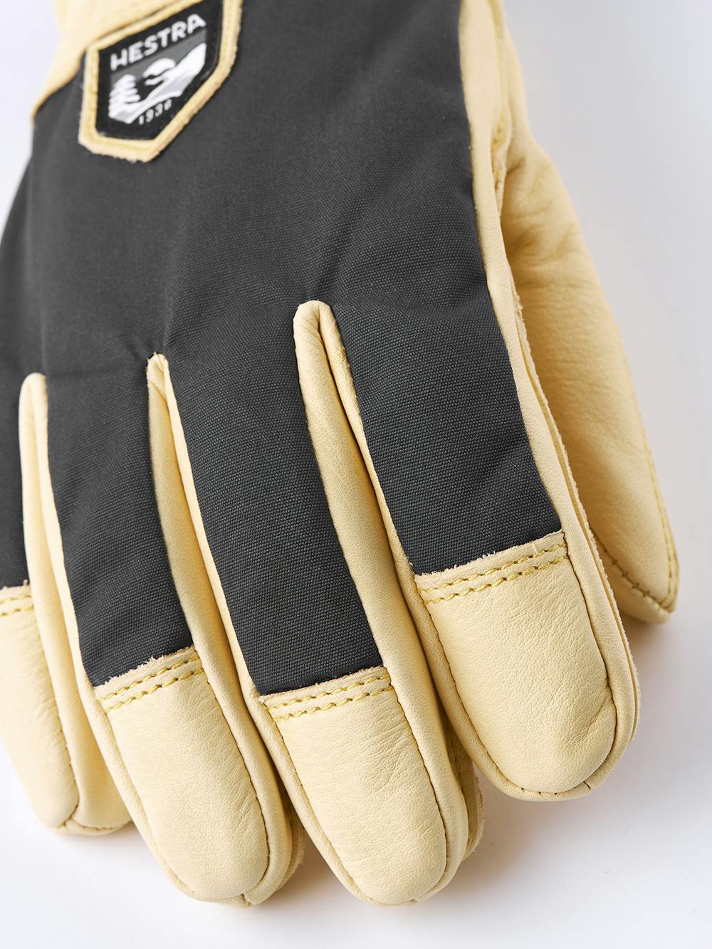 Yellow cow hide ski glove with gray fabric back
(2 of 5)