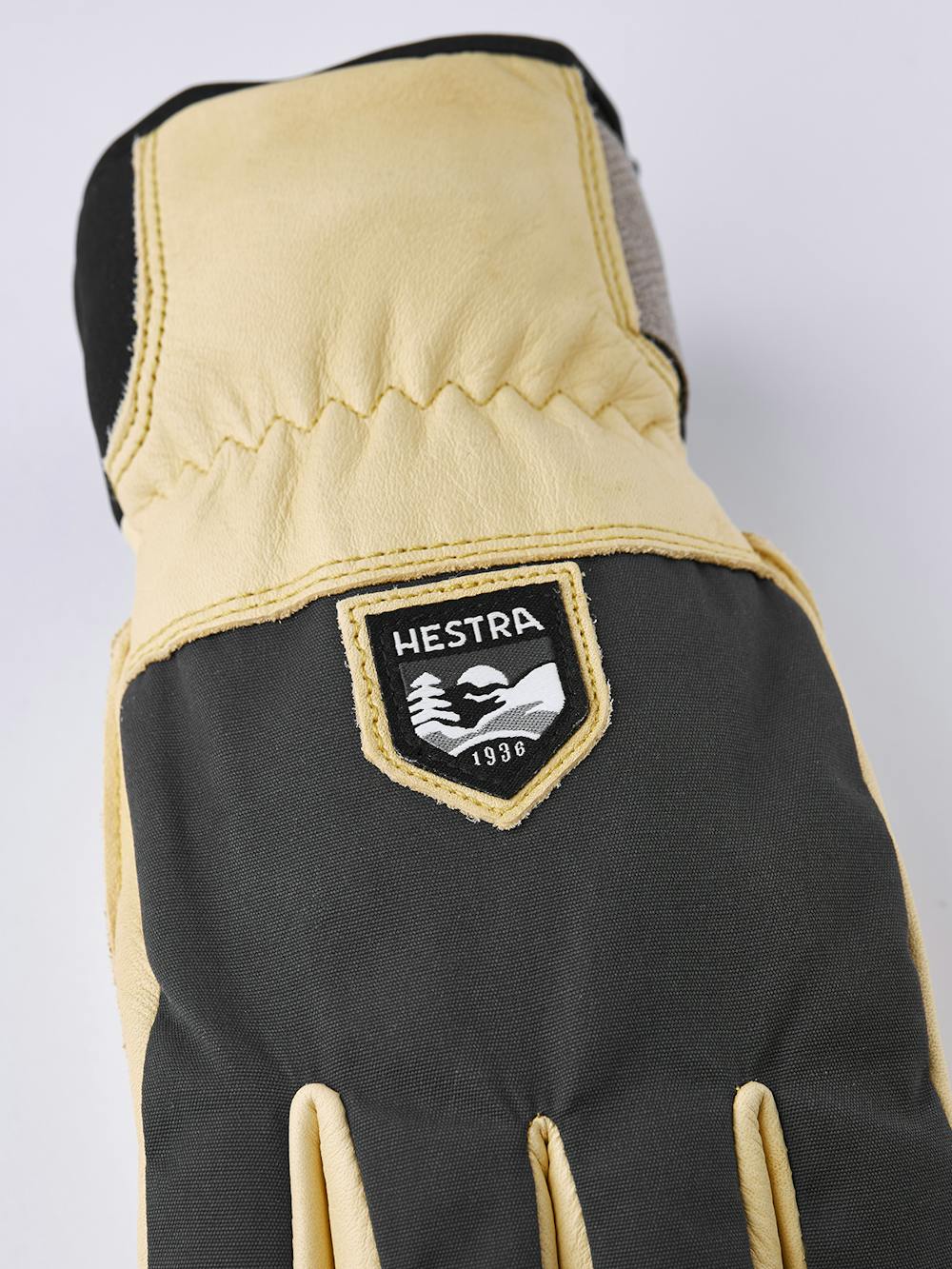 Yellow cow hide ski glove with gray fabric back
(3 of 5)