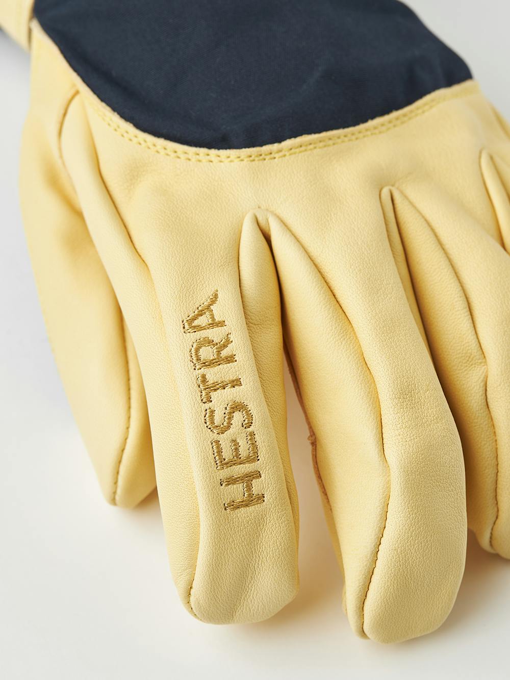 Blue ski glove with yellow cow hide palm
 (6 of 8)