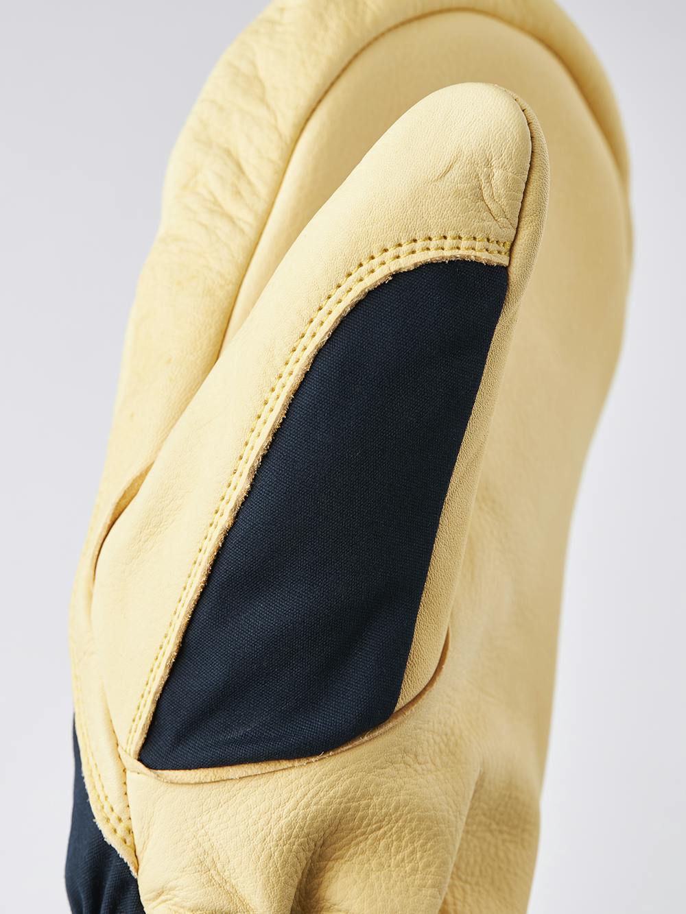 Blauer Fausthandschuh mit gelbem Rindsleder an der Innenhand
 (6 oder 8)