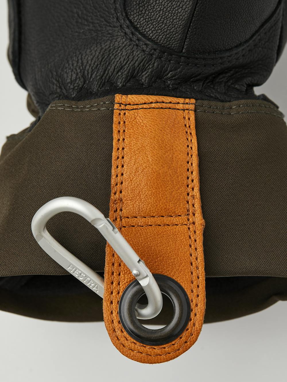 Dunkelgrüner Handschuh mit schwarzem Ziegenleder an der Innenhand
 (4 oder 4)